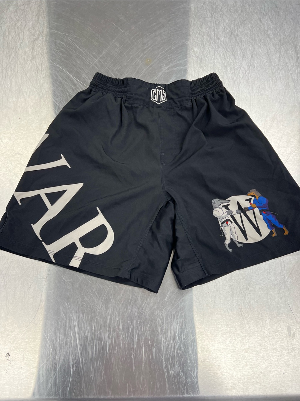 Muay Thai Boxing Black Athletic Shorts with “War” Dogs Graphic Panels